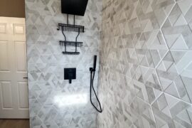 Custom Hexagonal Shower with Black Fixture Finish