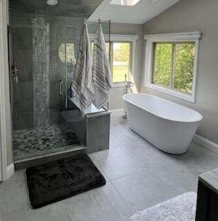 Master Bathroom Tile Installation with Freestanding Tub