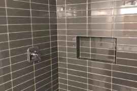 Glass Tile Shower with 3×12 Format and Wrapped Niche